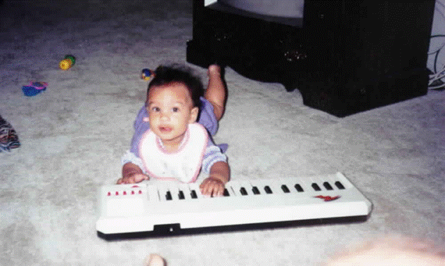 A picture containing floor, indoor, little, baby

Description automatically generated